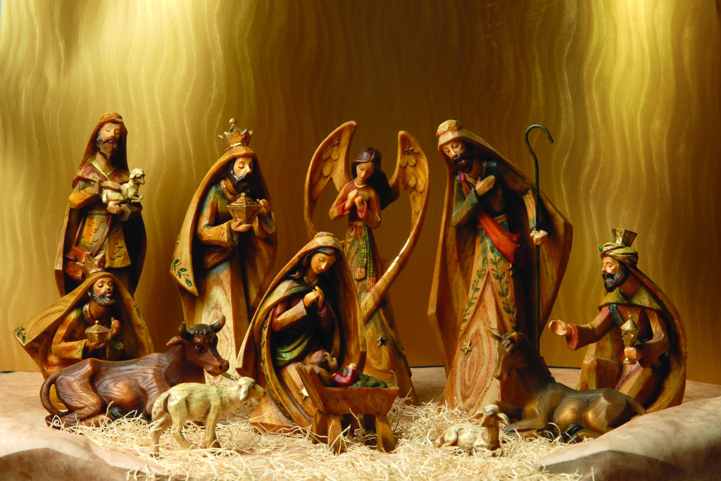 A nativity scene with baby Jesus, Mary, Joseph, the three magi, an angel, and animals.